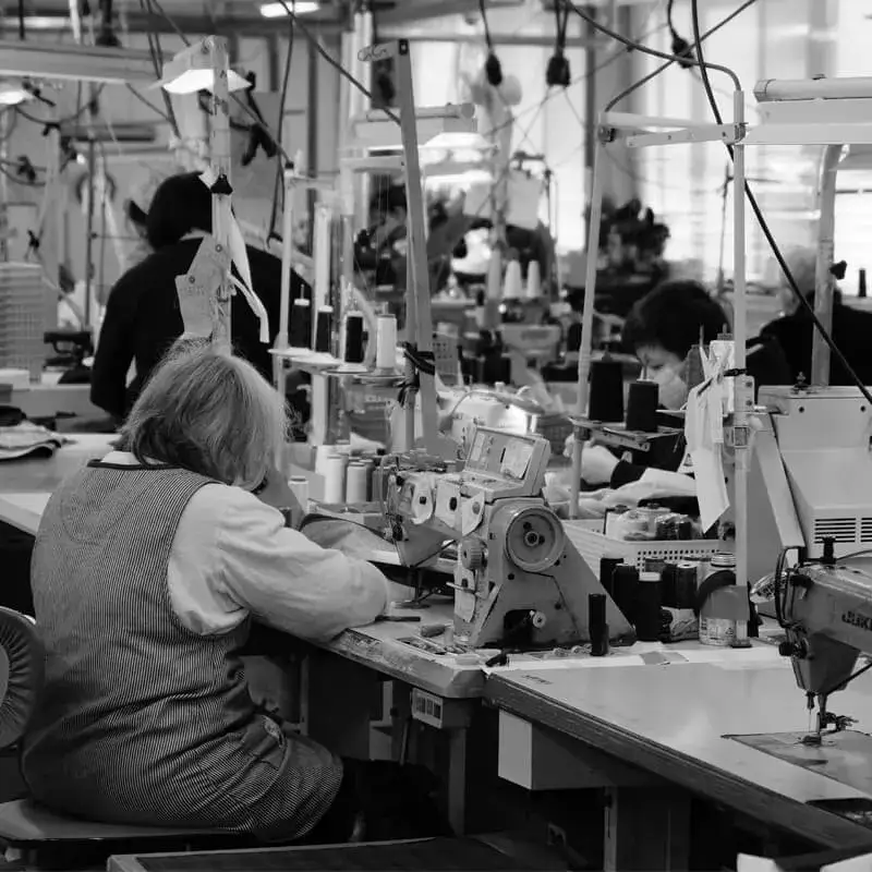 Jacket sleeve being finished by hand at the Japanese factory
